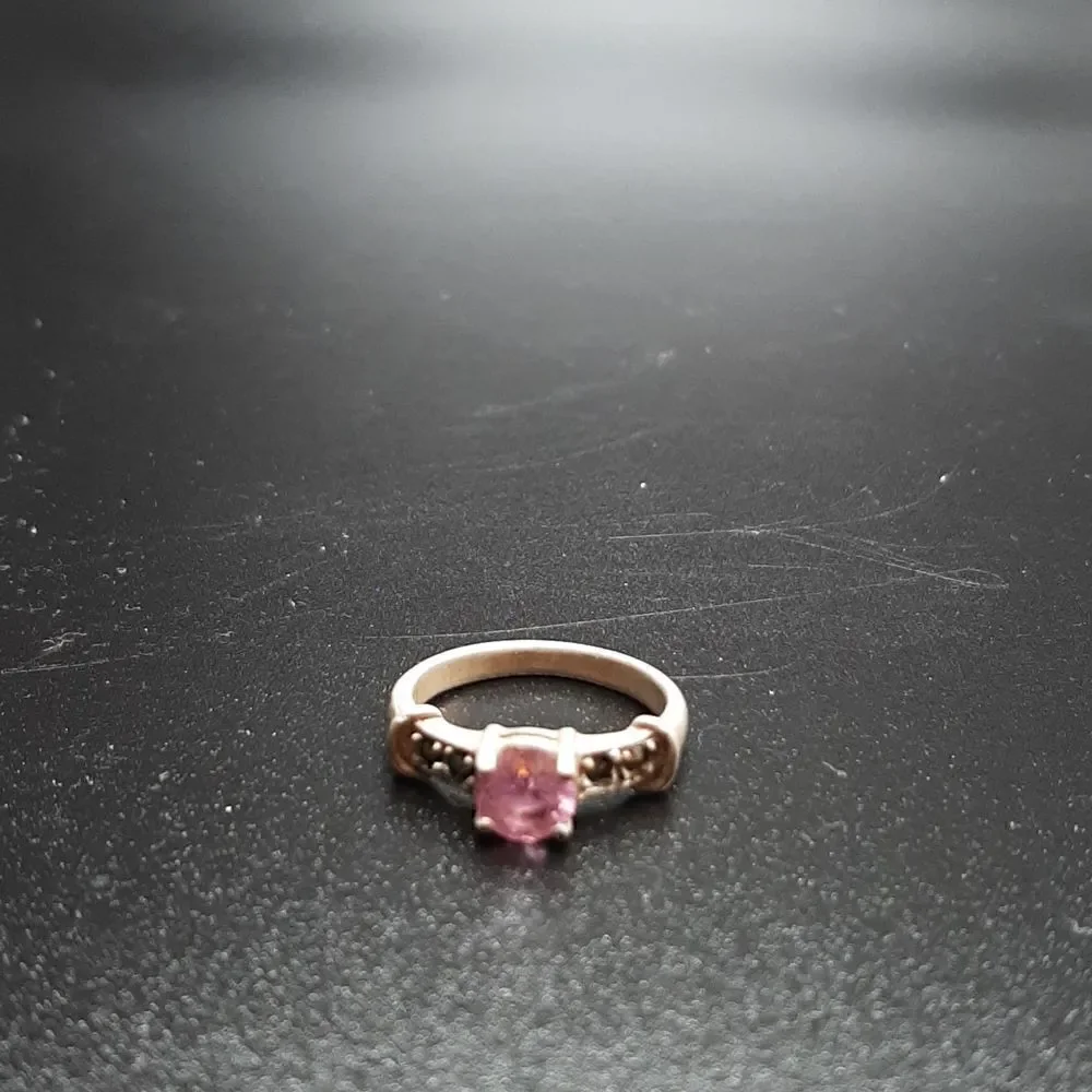 Sterling silver ring with pinkish glass stone and marcasite